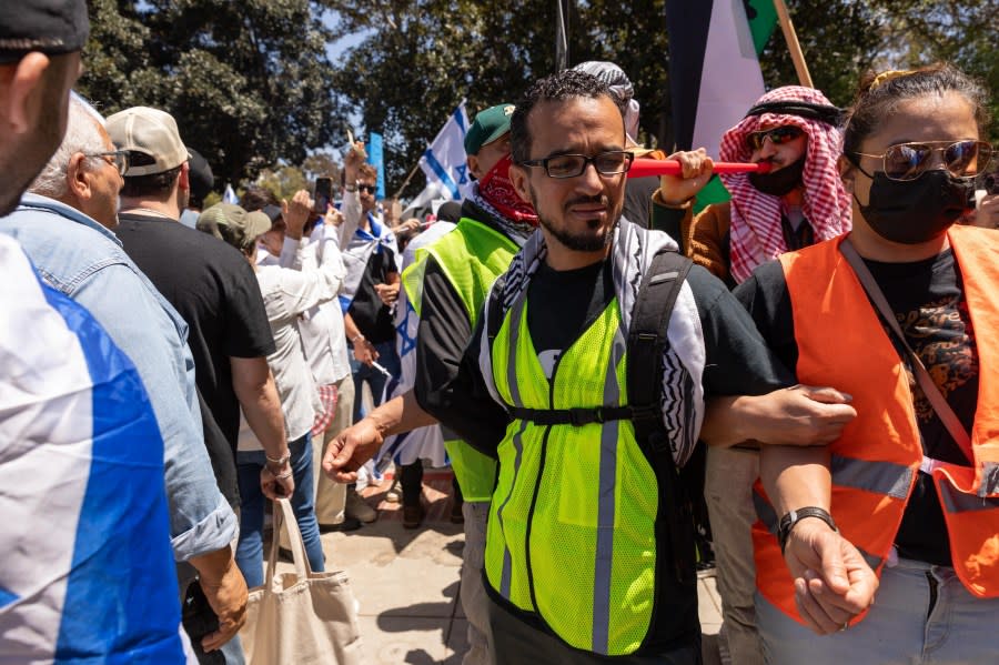 LOS ANGELES, CALIFORNIA – APRIL 28: Tension rises between Pro-Palestinian and pro-Israeli protestors on the campus of the University of California Los Angeles (UCLA) on April 28, 2024 in Los Angeles, California. (Photo by Grace Hie Yoon/Anadolu via Getty Images)