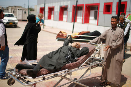 Patients arrive at the hospital in Qayyara, Iraq April 6, 2017. REUTERS/Suhaib Salem