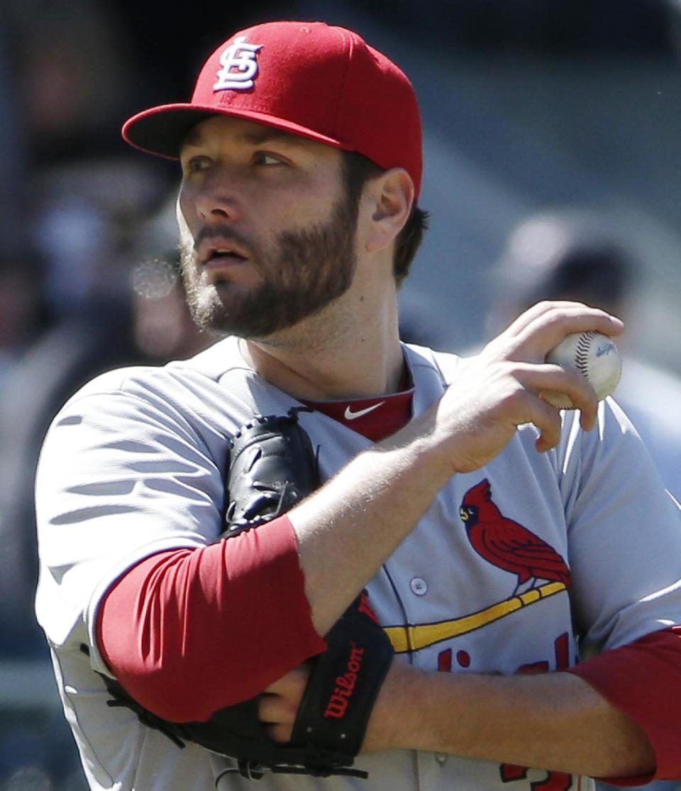 St. Louis Cardinals starting pitcher Lance Lynn pauses after allowing the go-ahead run on an RBI double to New York Mets' Daniel Murphy in the sixth inning of the Mets' 4-1 win in a baseball game in New York, Thursday, April 24, 2014. (AP Photo/Kathy Willens)