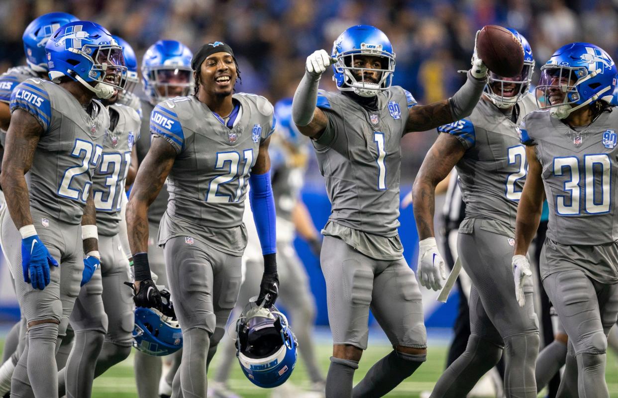 Detroit Lions Cam Sutton waves goodbye after intercepting a pass from Minnesota Vikings quarterback Nick Mullens at Ford Field in Detroit on Sunday, Jan. 7, 2024.