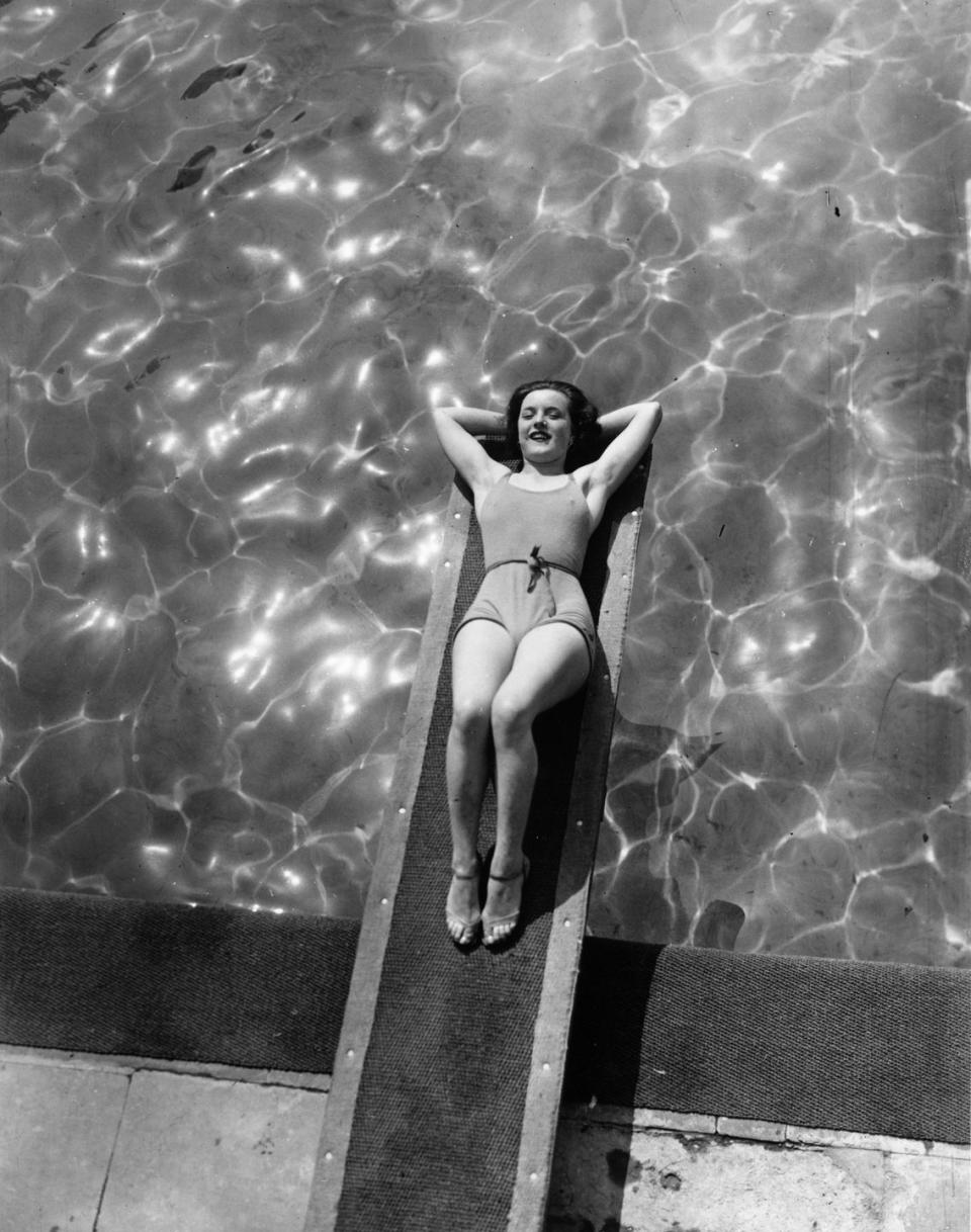 Chilling on a diving board: 1934