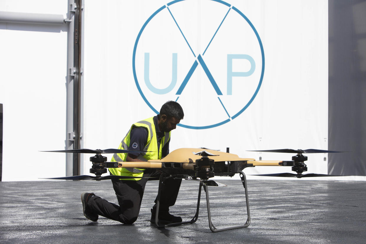 EDITORIAL USE ONLY Mathi Nithiyananthan prepares the T150 Malloy Aeronautics Ltd drone for take-off at the opening of Air-One by Urban-Air Port, Coventry. Issue date: Monday April 25, 2022.