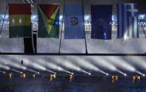 <p>Rain falls in Maracana Stadium before the closing ceremony of the 2016 Summer Olympics in Rio de Janeiro, Brazil, Sunday, Aug. 21, 2016. (AP Photo/Chris Carlson) </p>