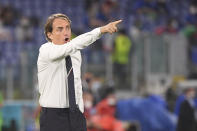 Italy's manager Roberto Mancini gives instructions from the side line during the Euro 2020 soccer championship group A match between Italy and Turkey at the Olympic stadium in Rome, Friday, June 11, 2021. (Alberto Lingria/Pool Photo via AP)