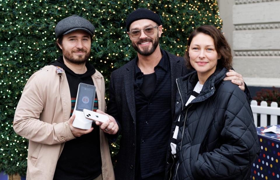 Emma and Matt Willis pose with Social Bite founder Josh Littlejohn (John Phillips)