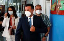 Macedonian Former Prime Minister and leader of the ruling SDSM party Zoran Zaev leaves a polling station after voting during the general election, in Strumica