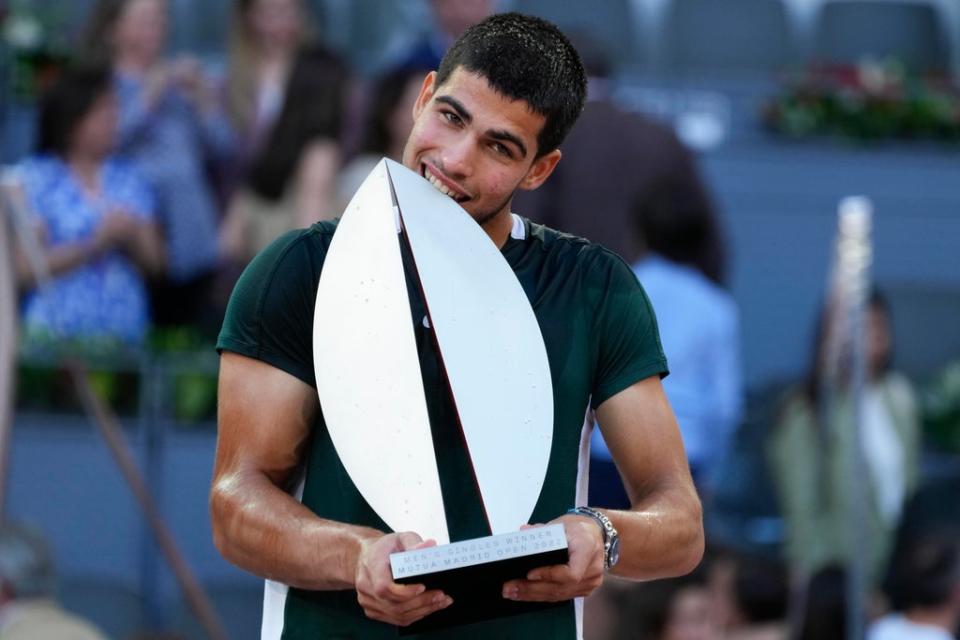Carlos Alcaraz with the Madrid Open trophy (Paul White/AP) (AP)