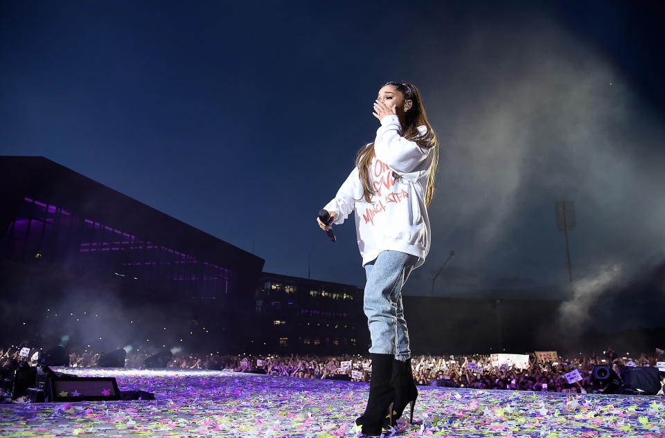 Ariana Grande wipes away a tear as she performs onstage during the One Love Manchester Benefit Concert at Old Trafford Cricket Ground on June 4, 2017, in Manchester, England. 
