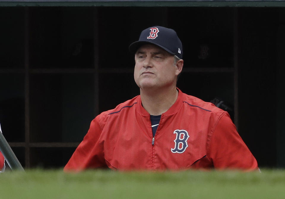 Boston Red Sox manager John Farrell watches from the dugout during the second inning in Game 3 of baseball’s American League Division Series against the Houston Astros, Sunday, Oct. 8, 2017, in Boston. (AP Photo)