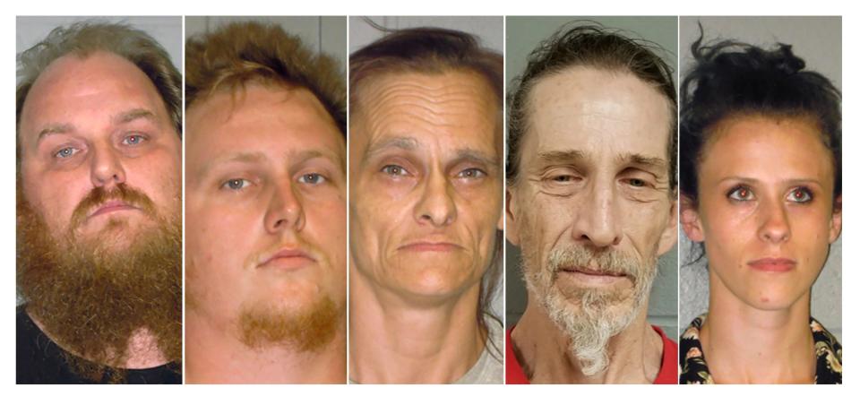 This combination of undated booking photos from the Shenandoah County Sheriff's Office shows from left to right, Donny Salyers, Dennis Salyers, Farrah Salyers, Christopher Sharp and Amanda Salyers.