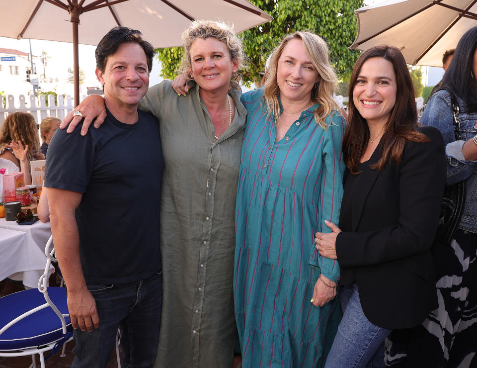 Scott Neustadter, Alison Rou, Liz Tigelaar and Lauren Neustadter smile at a launch event