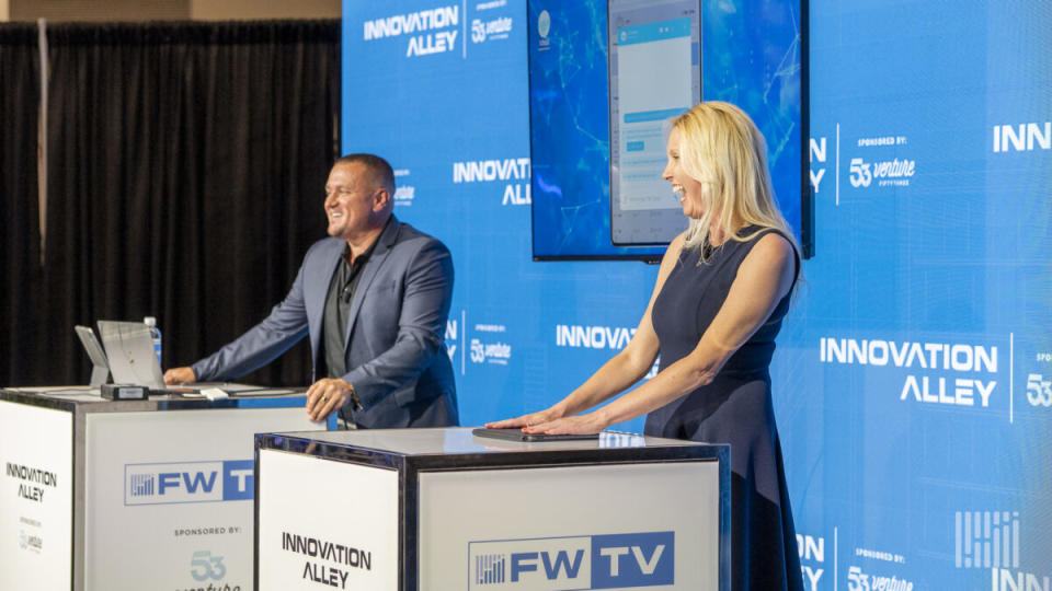 Ezlogz’s Sergey “Cj” Karman and Donna Overby discuss the company’s partnership with EzChatAI during their Innovation Alley demo at the FreightWaves’ Future of Supply Chain event in Cleveland on Thursday. (Photo: Jim Allen/FreightWaves)<br>