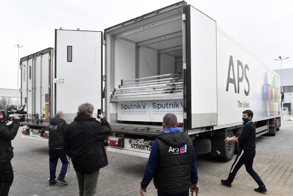 Boxes of Sputnik V vaccines are unloaded from a truck at a warehouse of Hungaropharma, a Hungarian pharmaceutical wholesale company, in Budapest, Hungary, Thursday, March 4, 2021. (Zoltan Mathe/MTI via AP)