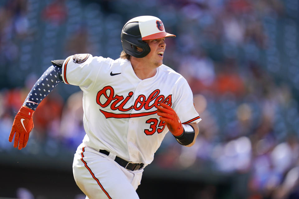 Baltimore Orioles' Adley Rutschman watches his double against the Texas Rangers during the ninth inning of a baseball game, Monday, July 4, 2022, in Baltimore. The Orioles won 7-6 in ten innings. (AP Photo/Julio Cortez)