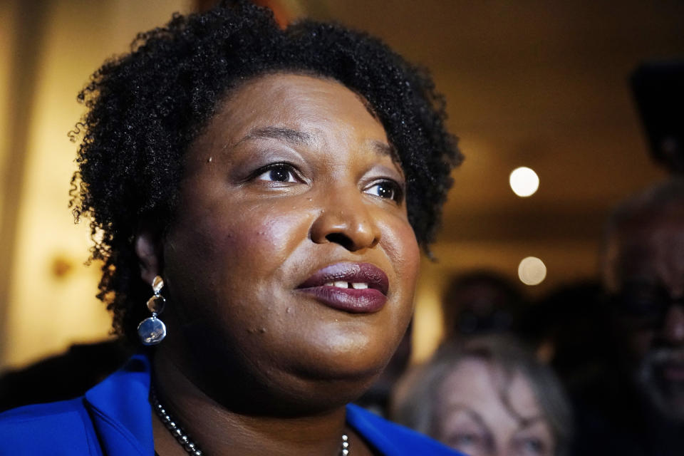 FILE - Georgia gubernatorial Democratic candidate Stacey Abrams talks to the media after qualifying for the 2022 election on March 8, 2022, in Atlanta. Abrams will face the winner of the state's May 24, 2022, GOP primary. (AP Photo/Brynn Anderson, File)