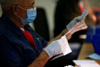 FILE PHOTO: FILE PHOTO: Operations at the Thurston County Ballot Processing Center in Tumwater