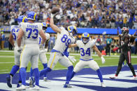 Los Angeles Rams tight end Tyler Higbee (89) celebrates after his touchdown catch during the first half of an NFL football game against the Tampa Bay Buccaneers Sunday, Sept. 26, 2021, in Inglewood, Calif. (AP Photo/Jae C. Hong )