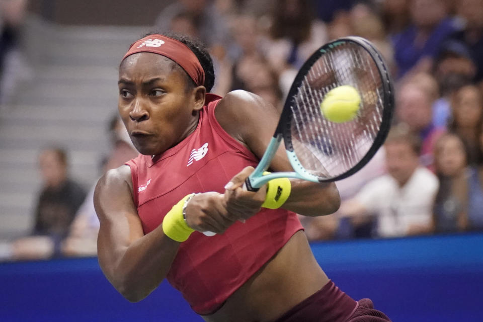 FILE - Coco Gauff, of the United States, returns a shot to Aryna Sabalenka, of Belarus, during the women's singles final of the U.S. Open tennis championships, Saturday, Sept. 9, 2023, in New York. Gauff is one of the players to watch at the Australian Open. The year's first Grand Slam tennis tournament is scheduled to start at Melbourne Park on Sunday, Jan. 14. (AP Photo/Charles Krupa, File)