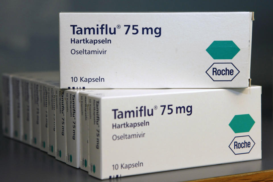 FILE - In this April 28, 2009 file photo packages of the medicine Tamiflu by Swiss pharmaceutical company Roche are seen in Stuttgart, southern Germany. A leading British medical journal is asking the drug maker Roche to release all its data on Tamiflu, claiming there is no evidence the drug can actually stop the flu. The drug has been stockpiled by dozens of governments worldwide in case of a global flu outbreak and was widely used during the 2009 swine flu pandemic. On Monday Nov. 12, 2012, one of the researchers linked to the BMJ called for European governments to sue Roche. (AP Photo/Thomas Kienzle, File)