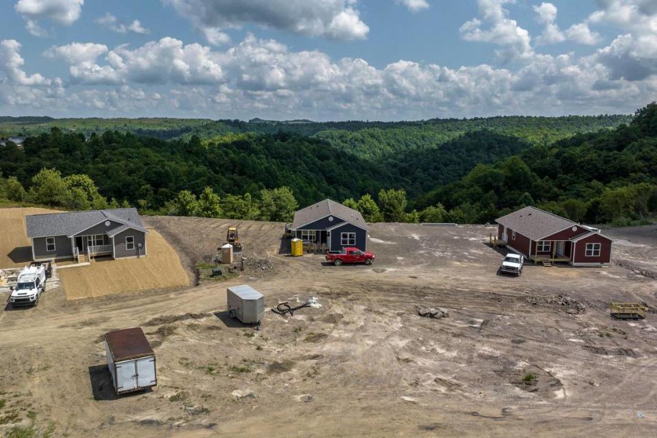 Construction is underway on homes for flooding victims in Perry County, Ky., on Tuesday, July 11, 2023. The Hazard-based Housing Development Alliance has so far completed nine homes, is working on a dozen more and completed about 30 repair jobs.
