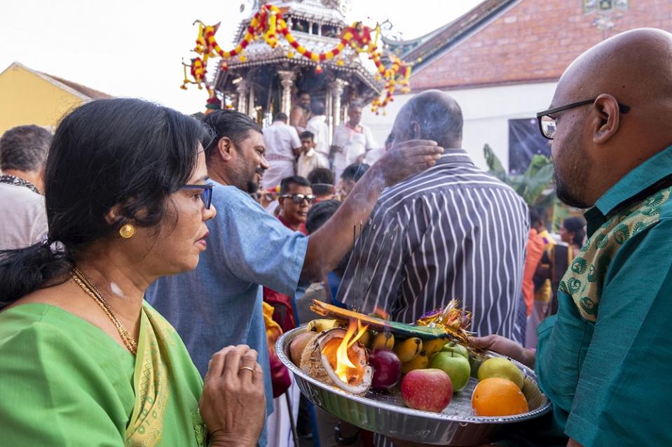 Devotees are seen making offerings to Lord Muruga in the Silver Chariot on the eve of Thaipusam in George Town February 7, 2020. — Picture by Steven Ooi KE