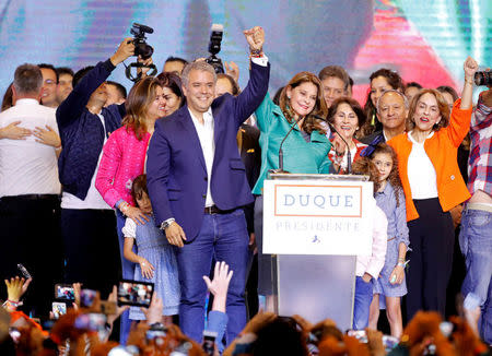 Presidential candidate Ivan Duque and his candidate for Vice President Marta Lucia Ramirez celebrate after he won the presidential election in Bogota, Colombia, June 17, 2018. REUTERS/Andres Stapff