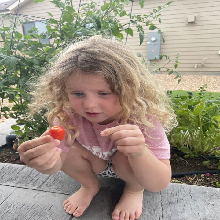 author's daughter in the garden