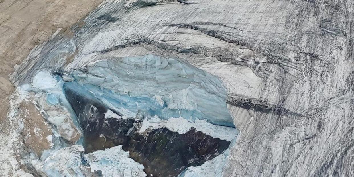 A handout photo from Alpine rescue services shows where an ice glacier collapsed on Marmolada mountain, Italy, July 3, 2022.