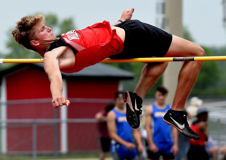 Ethan Budd of Milan cleared 6'4'' in the high jump to win the D2 Regional at Milan Friday, May 20, 2022.