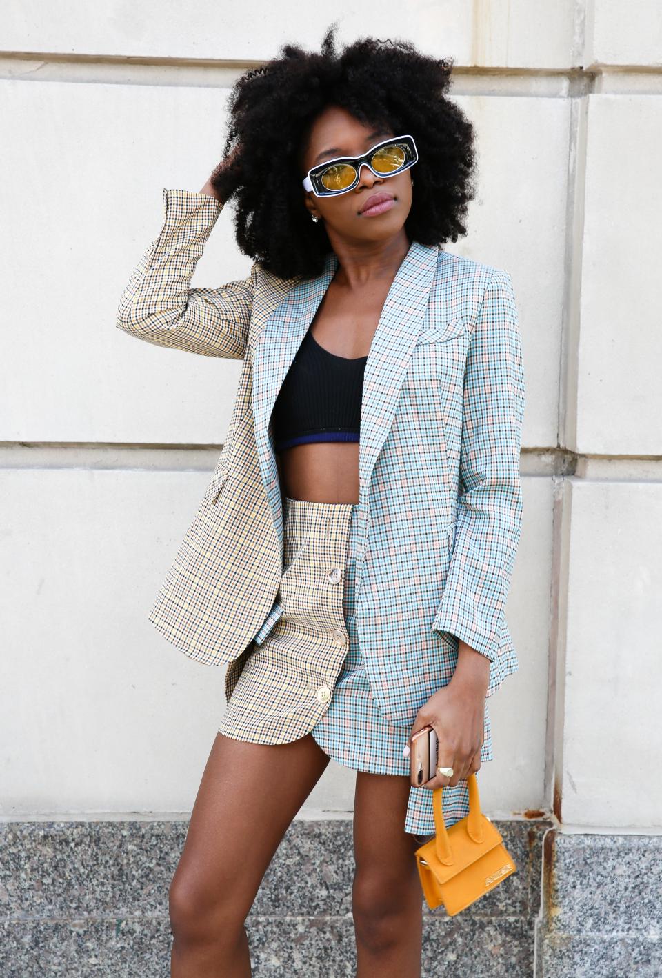 For a daring option, skip the shirts and style a plaid suit with a sports bra.