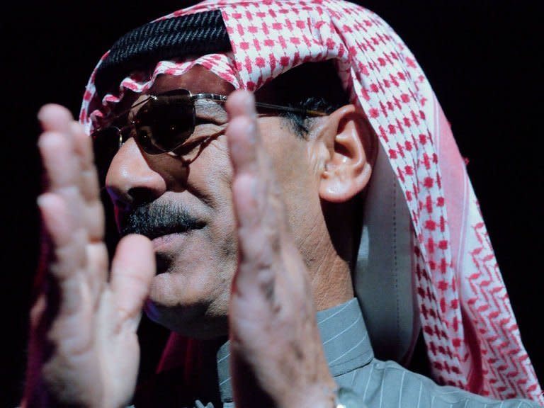 Syrian singer Omar Souleyman performs in the early hours of March 16, 2013 at a benefit concert for victims and refugees of the conflict in his homeland during the South by Southwest (SXSW) festival in Austin, Texas