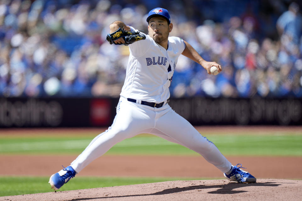 Toronto Blue Jays starting pitcher Yusei Kikuchi (16) works against the Cleveland Guardians during the first inning of a baseball game in Toronto, Sunday, Aug. 27, 2023. (Frank Gunn/The Canadian Press via AP)