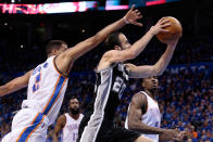 OKLAHOMA CITY, OK - MAY 31: Manu Ginobili #20 of the San Antonio Spurs goes up for a shot in front of Thabo Sefolosha #2 of the Oklahoma City Thunder in the second half in Game Five of the Western Conference Finals of the 2012 NBA Playoffs at Chesapeake Energy Arena on May 31, 2012 in Oklahoma City, Oklahoma. NOTE TO USER: User expressly acknowledges and agrees that, by downloading and or using this photograph, User is consenting to the terms and conditions of the Getty Images License Agreement. (Photo by Brett Deering/Getty Images)