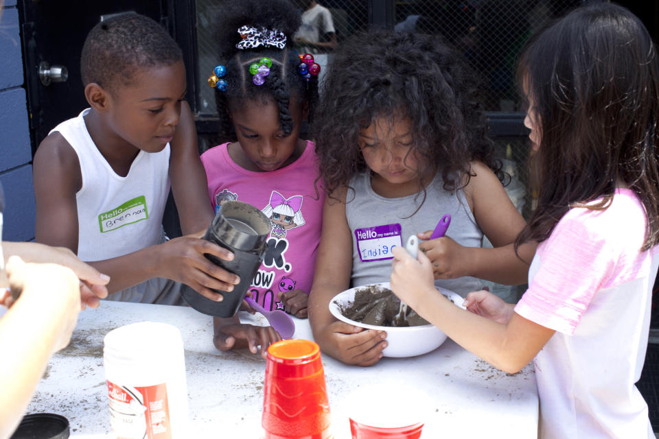 All four of Jennifer Lyles's children attend the Soil Sisters' camp. The first week, she struggled to convince them to come home with her.  (Courtesy Sarah Warda)