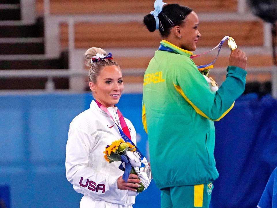 MyKayla Skinner and Rebeca Andrade pose with their medals after the Tokyo Olympics women's vault final.