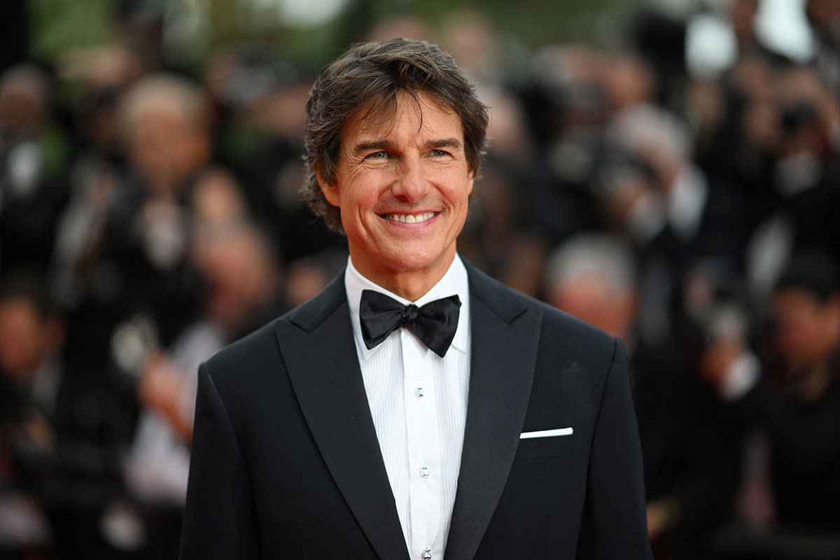 El actor estadounidense Tom Cruise posa en su llegada a la proyección de 'Top Gun: Maverick' durante la 75 edición del Festival de Cine de Cannes, en el sur de Francia, el 18 de mayo de 2022 (Foto: PATRICIA DE MELO MOREIRA/AFP via Getty Images)