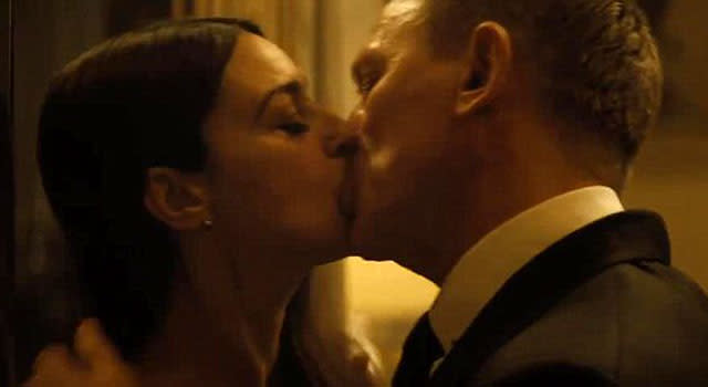 Sam Smith's "Writing's on the Wall" music video is here, and it features some sexy scenes of James Bond and his <em>Spectre</em> leading lady. Smith's brooding James Bond theme song seems to work perfectly as the background music to a hot and heavy make-session between Daniel Craig and co-star Monica Bellucci. Vevo Between scenes from the film, Smith is seen somberly singing in front of several Union Jack-draped coffins. <strong> WATCH: Sam Smith Sloppily Sings Beyonce's 'Flawless' After Tweeting in Sick </strong> The 23-year-old singer debuted "Writing's On the Wall" this past month, and it might not be what fans are expecting from the R&B singer. "If I risk it all, could you break my fall?" Smith croons. "How do I live? How do I breath? When you’re not here I’m suffocating. I want to feel love flow through my blood, tell me is this where I give it all up. For you, I have to risk it all. Because the writing’s on the wall." The "Stay With Me" singer was understandably nervous for people to hear it, joking that it "could be a pile of crap." "To be honest, it hasn't set in yet," Smith told ET special correspondent Elvis Duran backstage at the iHeartRadio Music Festival. "I keep looking at that Wikipedia page and just seeing my name on it -- and it's unreal." <strong> MORE: Monica Bellucci, 50, Is the Oldest James Bond Girl, And She Prefers 'Bond Woman' </strong> Smith's has nothing to worry about. He's already made history after the song became the first ever Bond theme track to reach number one on the U.K. charts. <strong> What do you think of the "Writing's On the Wall" music video? </strong> <em>Spectre</em> hits theaters November 6. Check out the trailer below.