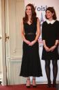 <p>Kate arrived in Paris wearing a textured black Alexander McQueen gown worth around £4000. Her Gianvito Rossi pumps cost over £600.<br><i>[Photo: PA]</i> </p>