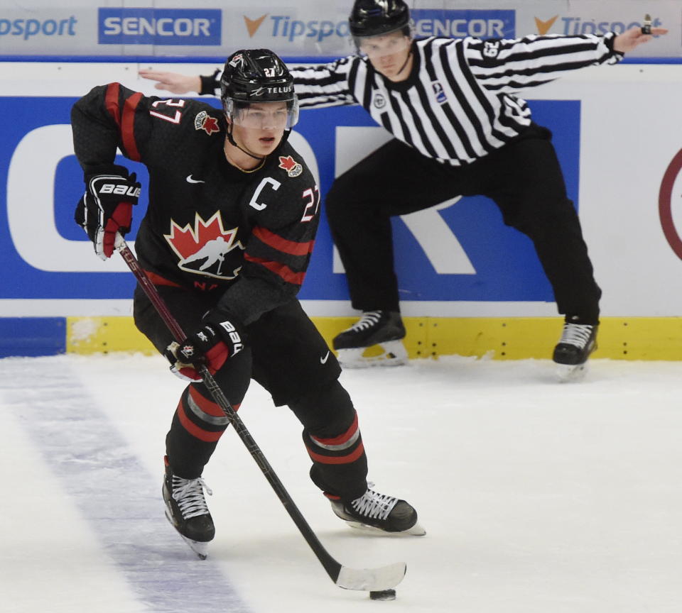 Canada's captain Barrett Hayton left Saturday's semifinal against Finland with an apparent injury. (Jaroslav Ozana/CTK via AP)