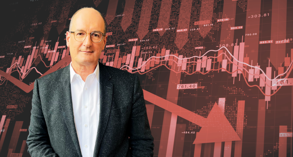 Stylised graphic of David Koch on red background of financial charts and down arrow to represent recession.