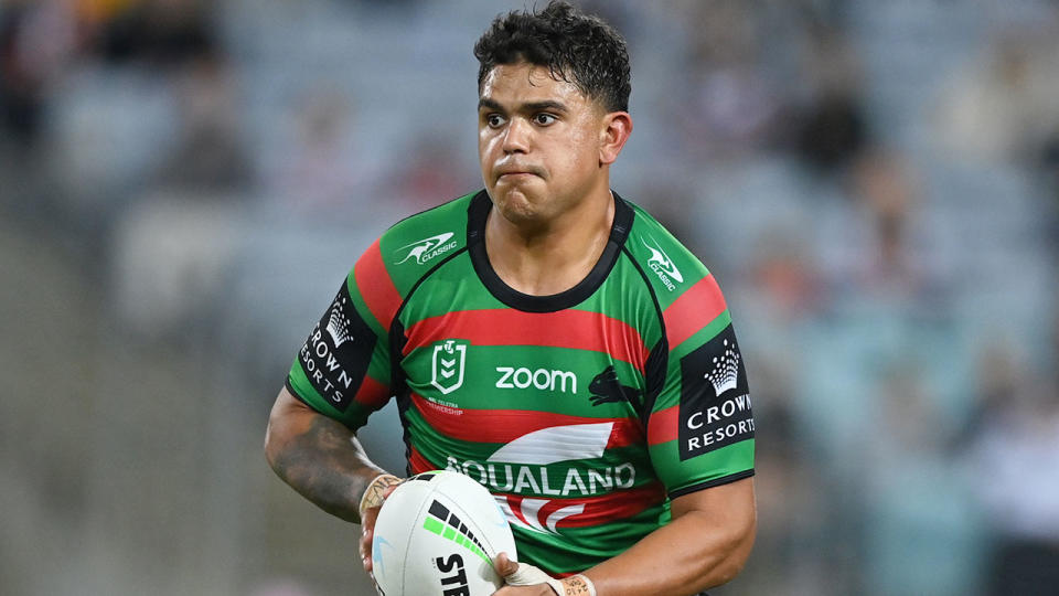 Seen here, South Sydney's Latrell Mitchell carries the ball in the match against the Tigers. 