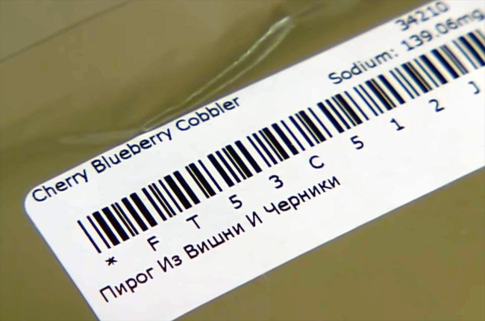 Closeup of a white tab with a barcode.