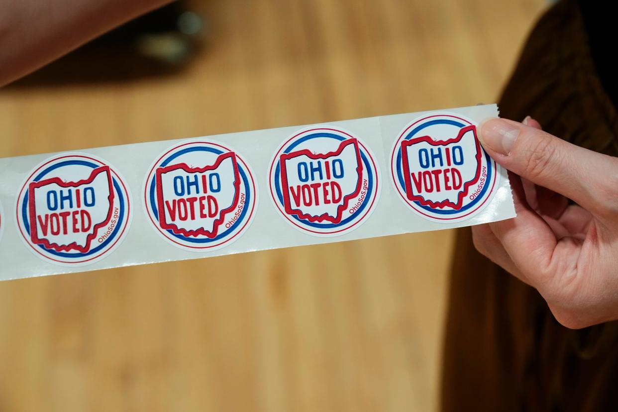 Aug 8, 2023; Columbus, Ohio, USA; Stickers are given out to voters who cast their ballots during a special election for Issue 1 at the Schiller Recreation Center in German Village. 