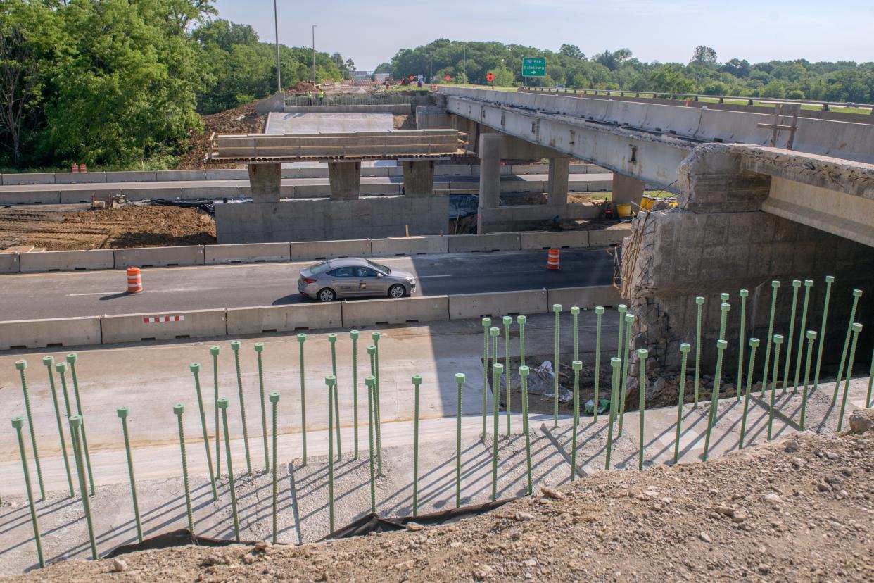 Traffic passes under the Airport Road overpass at Interstate 474 near Gen. Wayne A. Downing Peoria International Airport. The bridge is being rebuilt starting with the southbound span. Workers are nearly ready to install the steel beams.