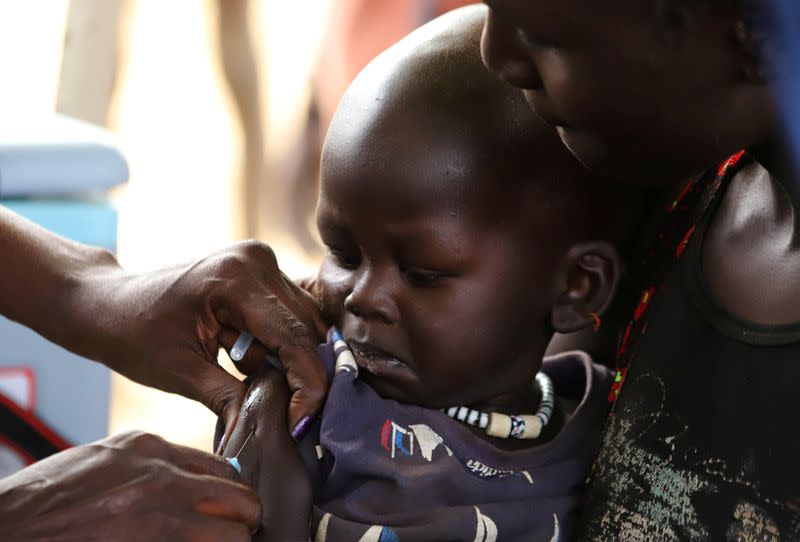 FILE PHOTO: A South Sudanese child receives a vaccination against measles during a campaign in Juba