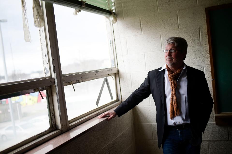 Developer Buzz Goss gives a tour of Broadway Baptist Church's Pollard Building, which he is planning to transform into apartments. Goss simultaneously is working on a seven-story downtown development that will include apartments, retail, and office space, with below-ground parking, next to Marble Alley Lofts on State Street.