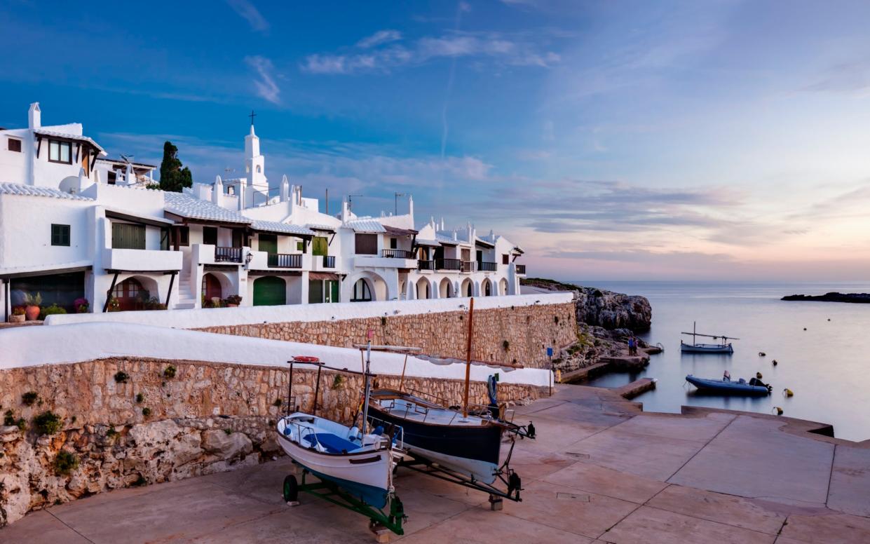 Idyllic Binibeca Vell at dusk