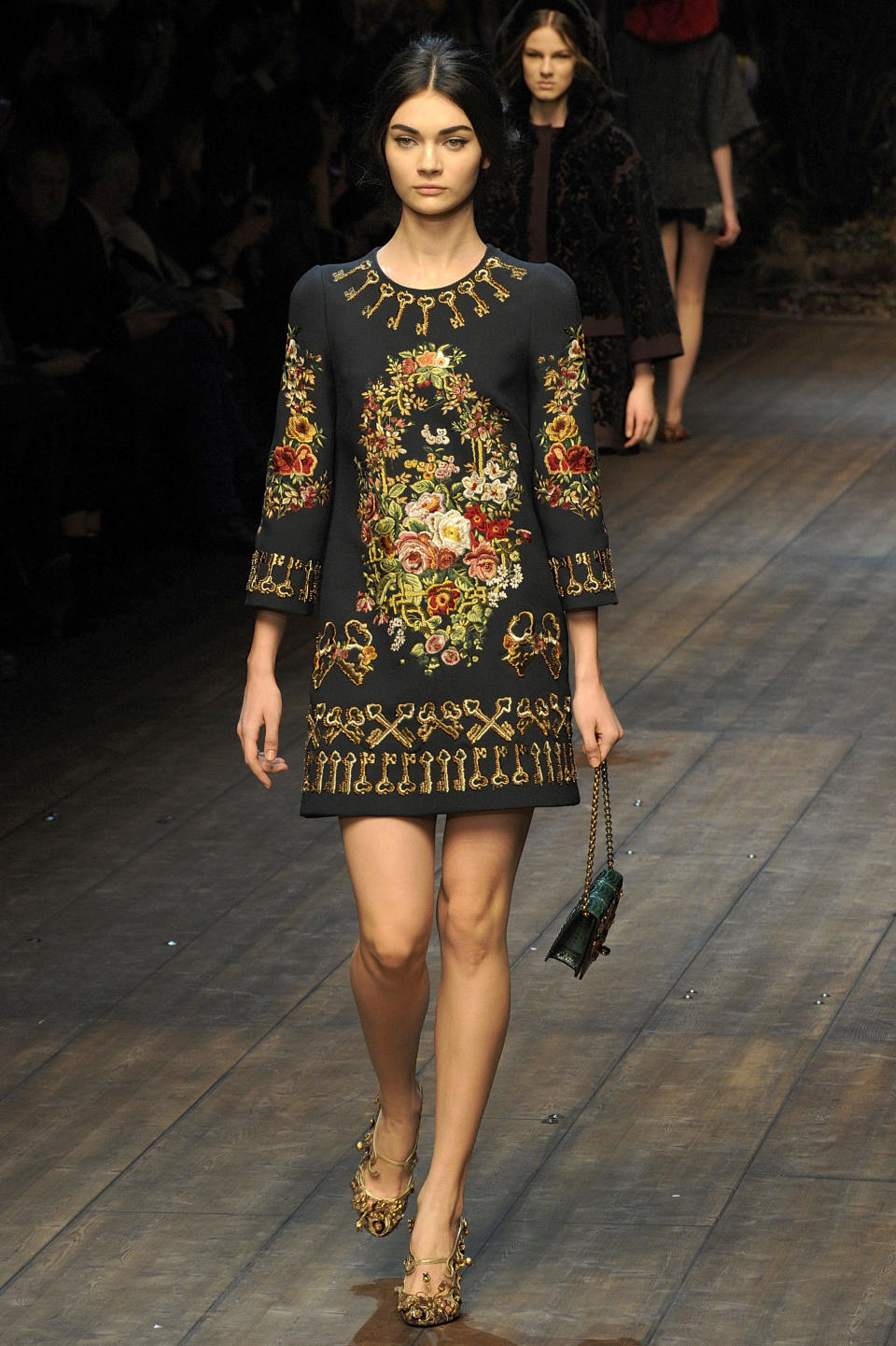 A model wears a creation for Dolce & Gabbana women's Fall-Winter 2014-15 collection, part of the Milan Fashion Week, unveiled in Milan, Italy, Sunday, Feb. 22, 2014. (AP Photo/Giuseppe Aresu)