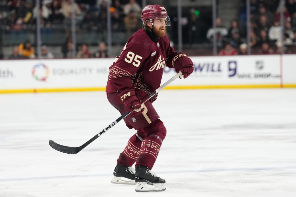 Arizona Coyotes defenseman Cameron Crotty (95) skates against the Dallas Stars during the second period at Mullett Arena. It was the first game of Crotty's career.