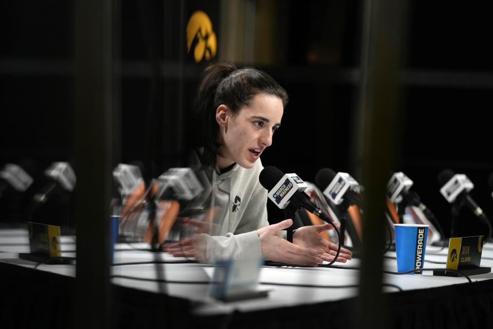 Iowa's Caitlin Clark speaks during a press conference before practice for the NCAA Women's Final Four championship basketball game on Saturday, April 6, 2024, in Cleveland. (AP Photo/Carolyn Kaster)